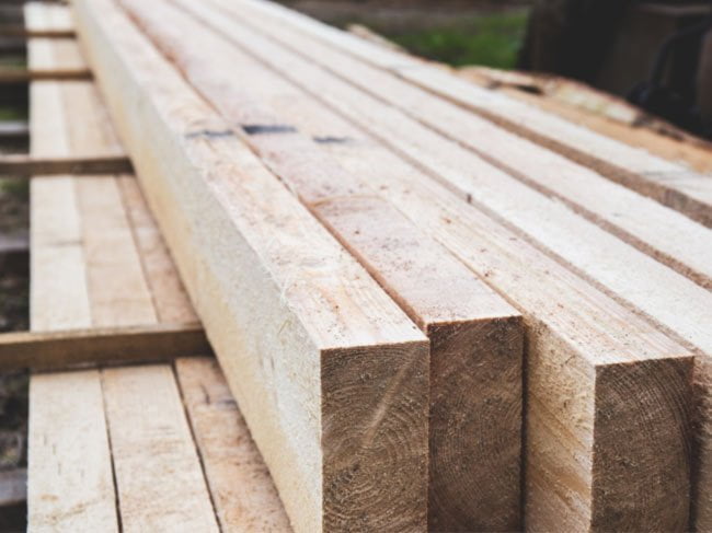 Stack of sawn rough timber planks